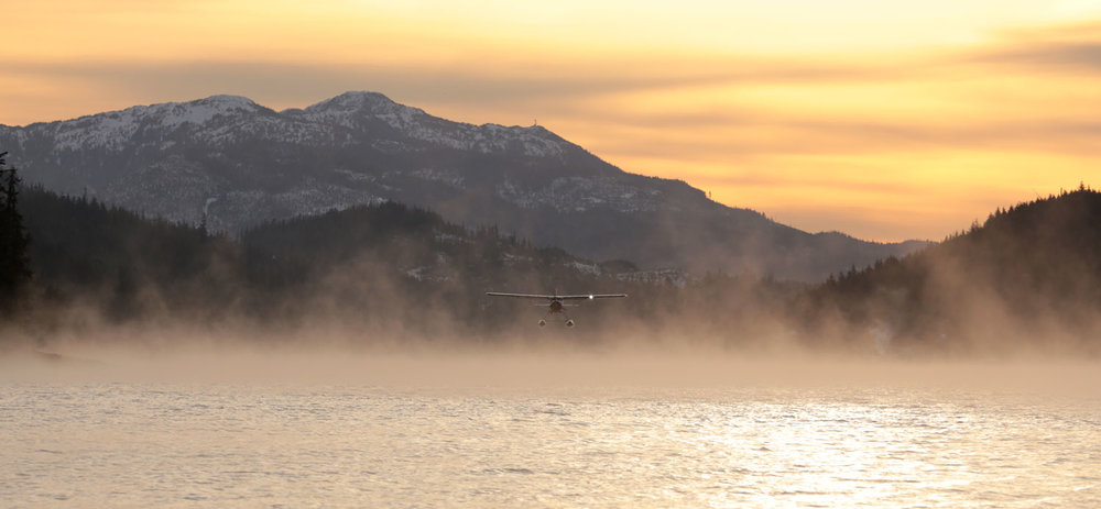 de Havilland Beaver floatplane landing in the mist Thorne Bay Southeast Alaska