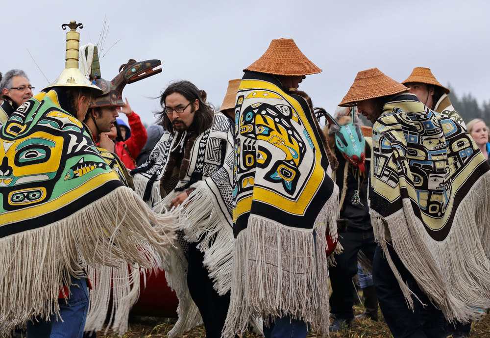 Alaska Native Elders and clan leaders dancing after the canoes landed on Shakes Island.