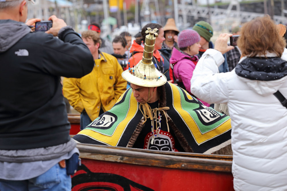 Dancing between the canoes and through the cameras.