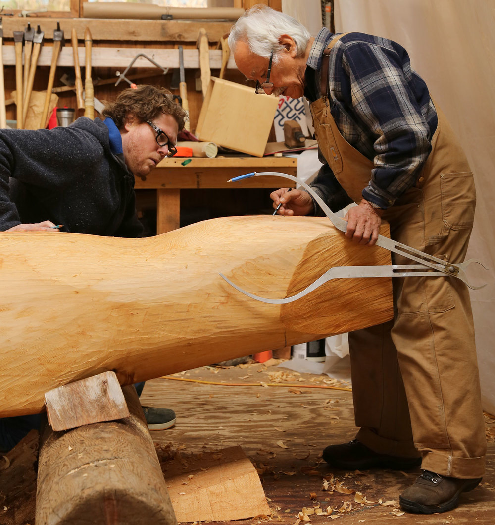 Donald Varnell and Nathan Jackson measuring and marking.