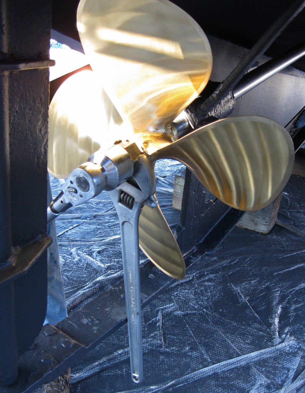 Bracing the prop nut while tightening the jam nut.