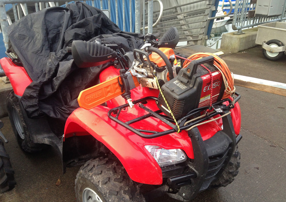 Four wheeler ATV with chainsaw and generator