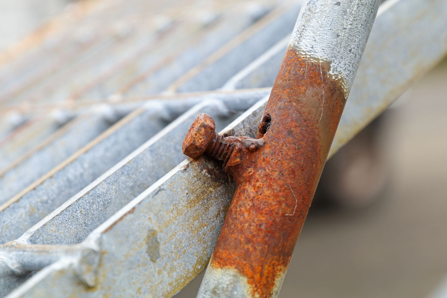 Attachment for conduit to walkway