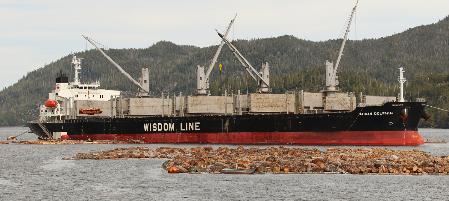 Cargo ship Daiwan Dolphin loading logs near Prince of Wales Island in Southeast Alaska
