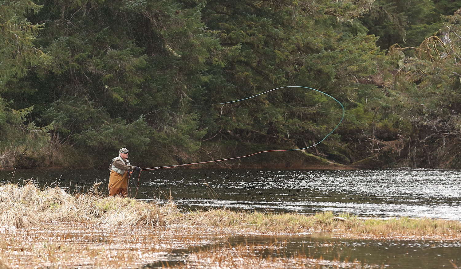 This fisherman nodded approval when I hand signaled a request to photograph him. Thank you, Fly Fisherman!