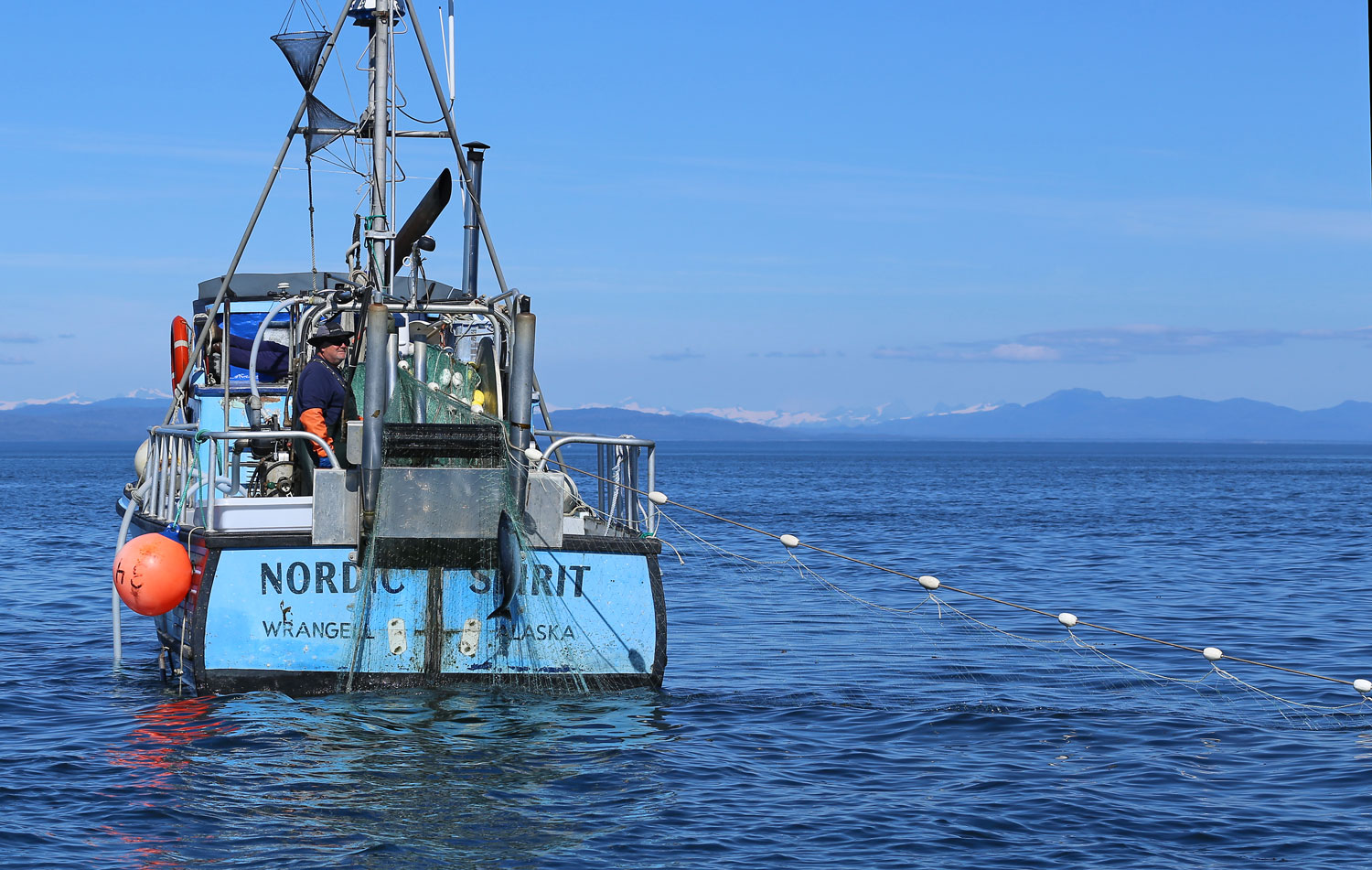 The gillnetter "Nordic Spirit" bringing in a nice silver salmon in Sumner Strait.