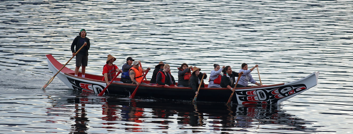 A Haida canoe arriving at Kasaan, Alaska.