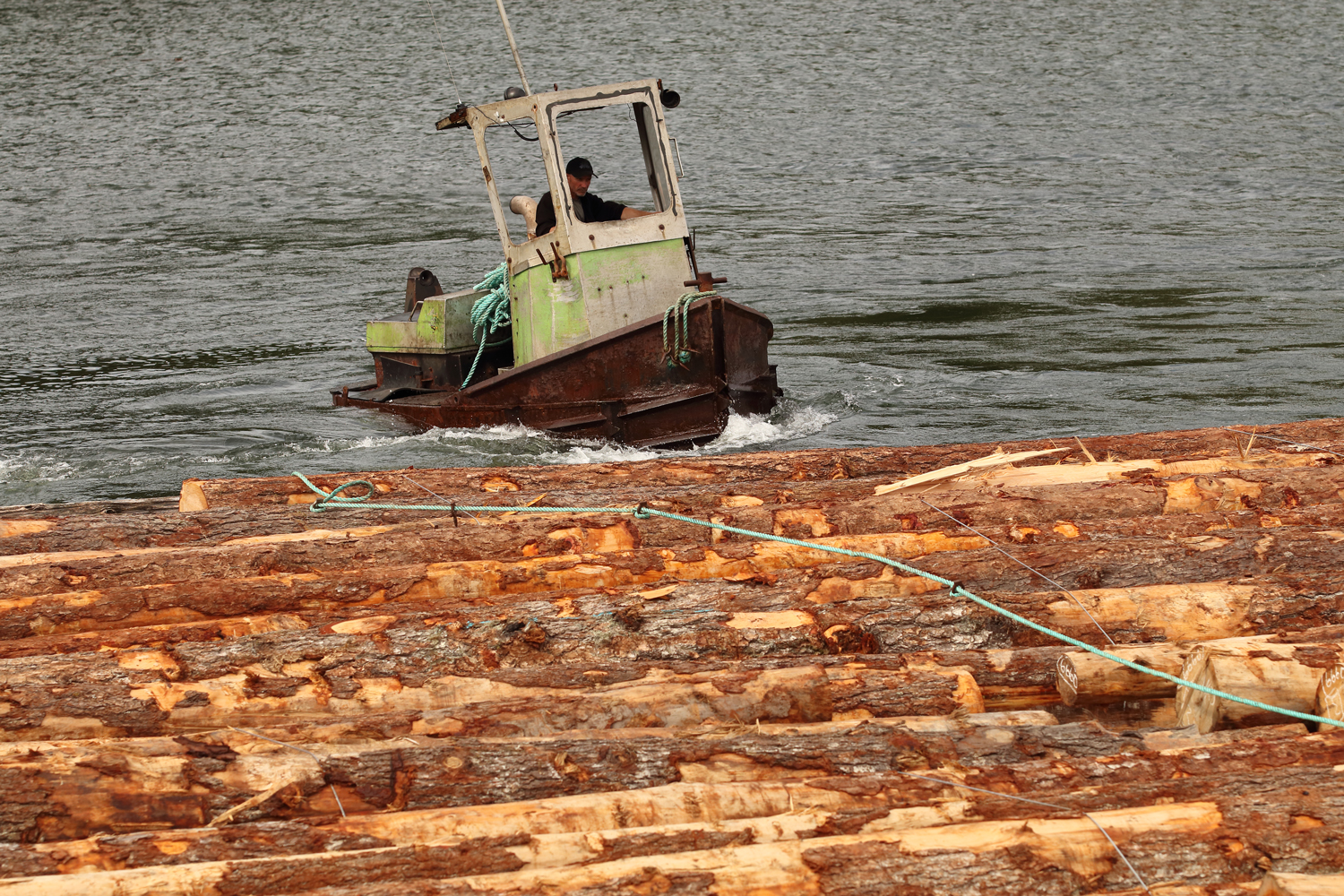 Log bronc sidewinder boom boat log raft Prince of Wales Island Southeast Alaska