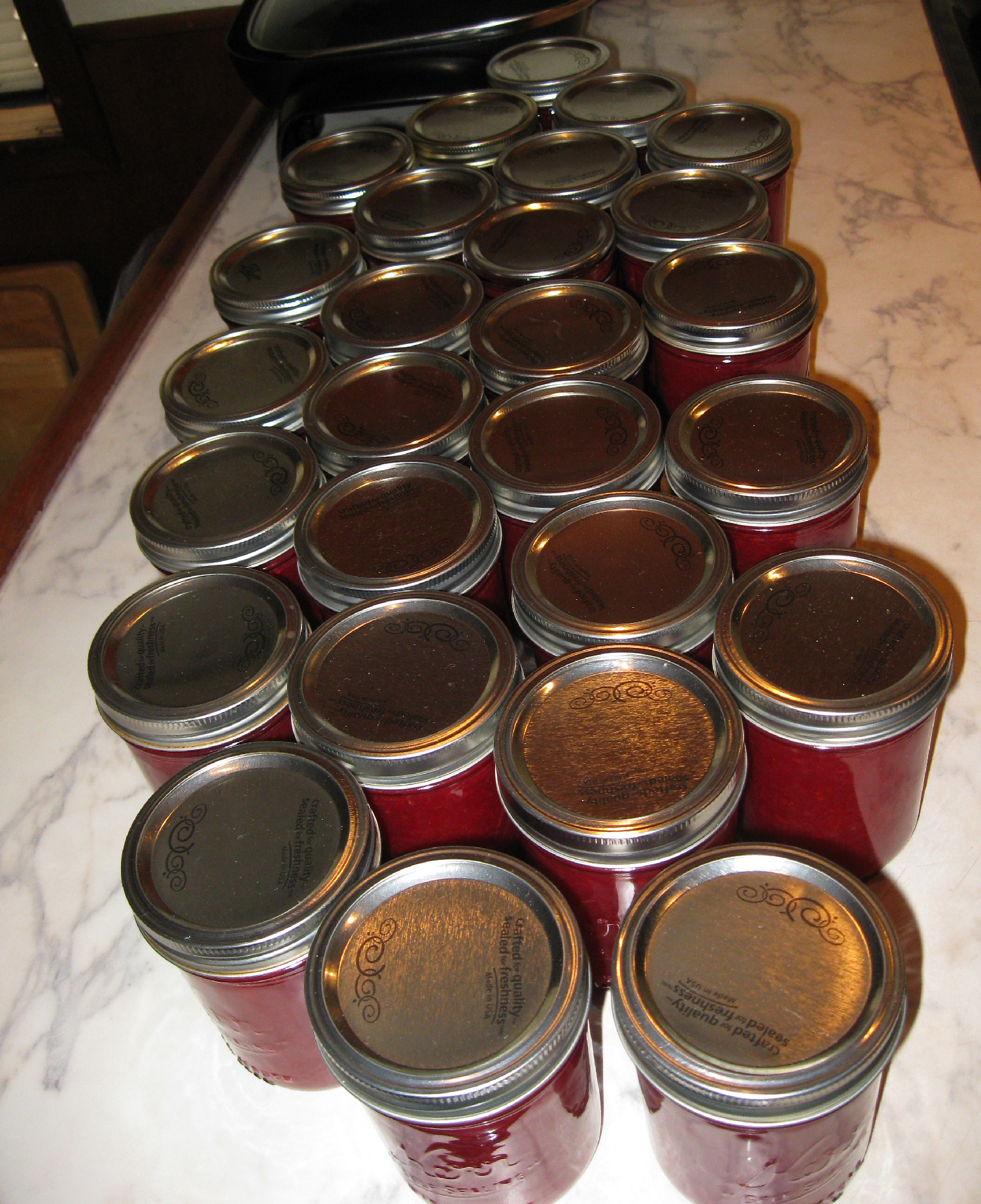 Red huckleberry jam ready for labeling. I thank my wonderful sweetheart for preserving this goodness in jars.