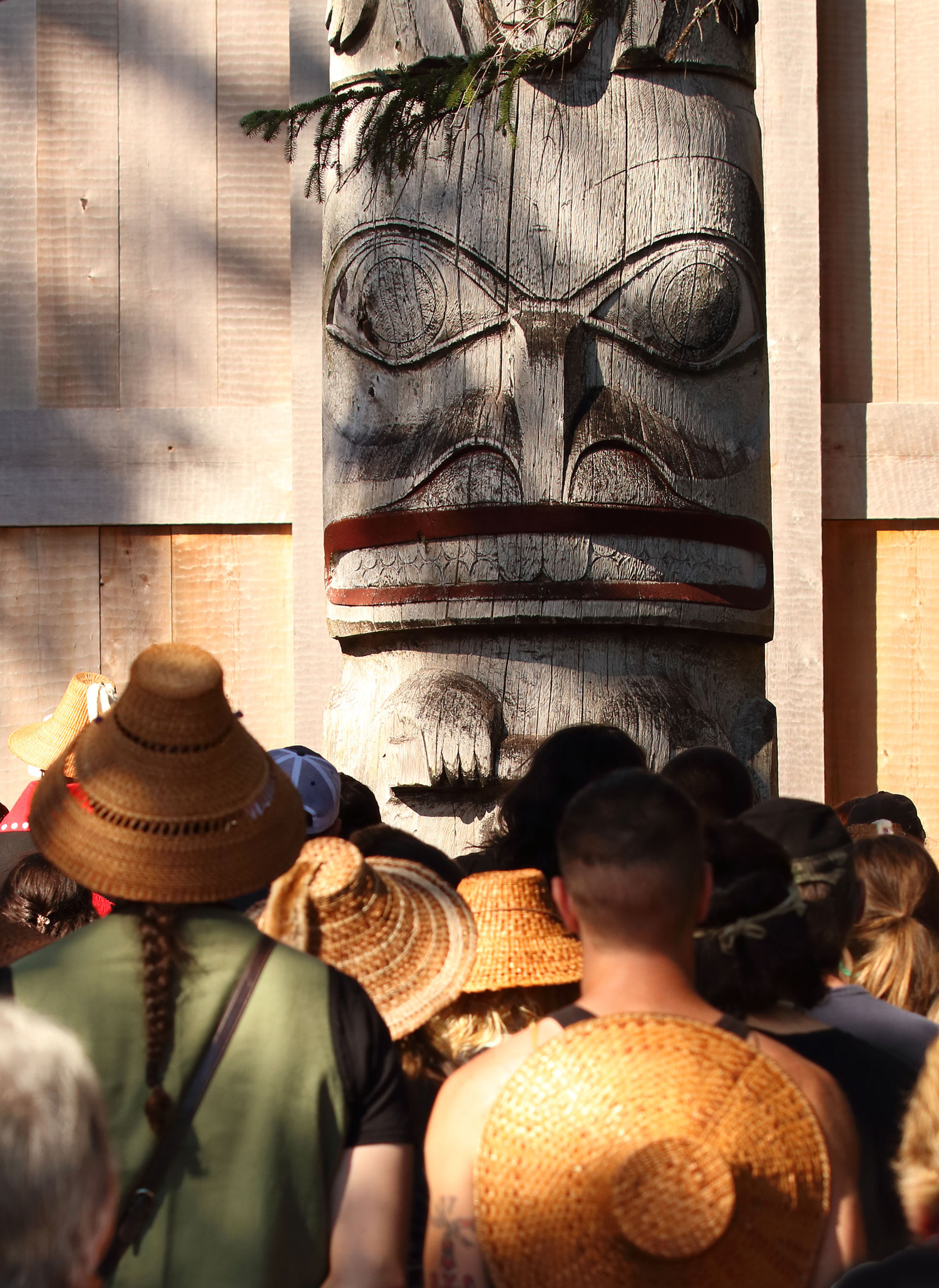 There was a big crowd at the Whale House. The frontal totem in this photo is huge and towers over 50 feet high.