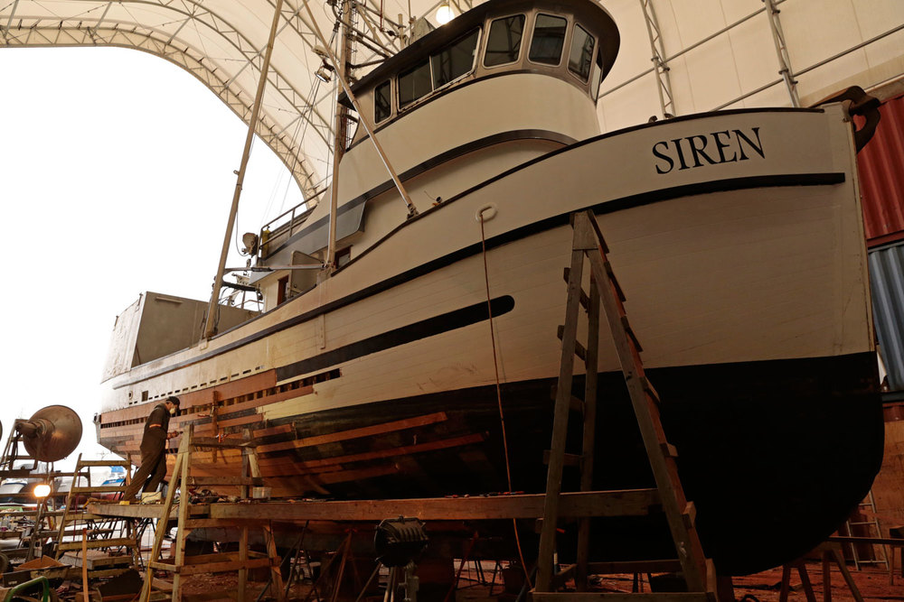 Wood fishing boat FV Siren Petersburg Wrangell Marine Service Center shipyard boatyard replacing planks shipwright boatwright seiner longliner troller