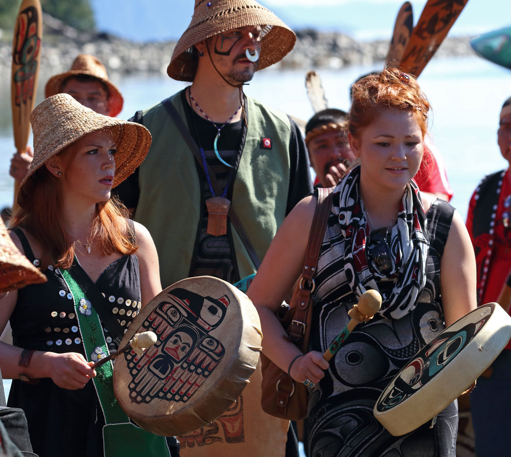 Haida drummers dance and sing at the Whale House Rededication Ceremony.