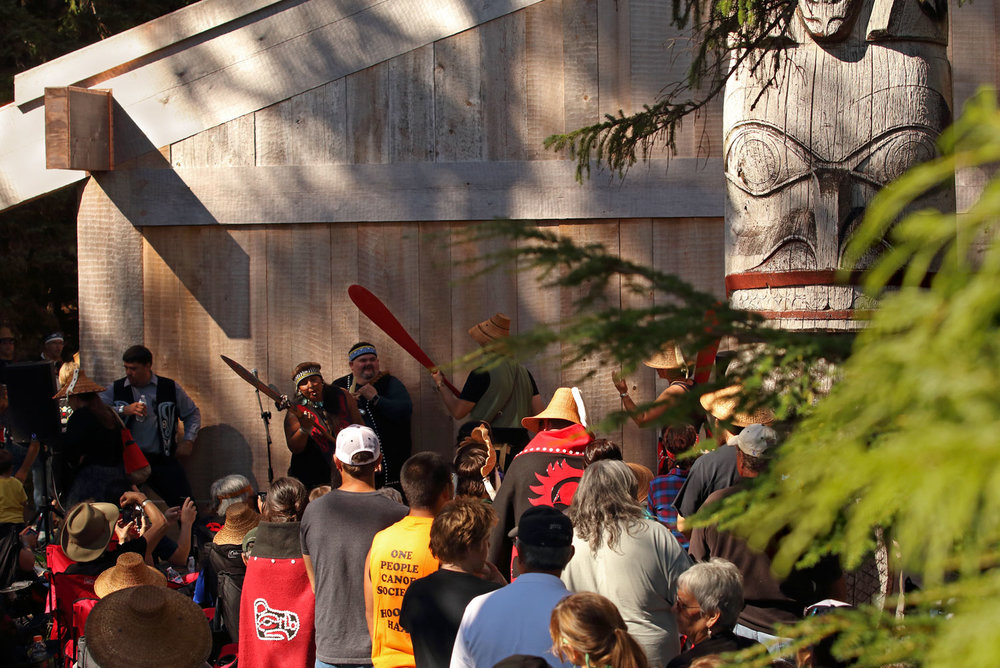The Haida dancers sang and drummed as they danced their way around the longhouse.