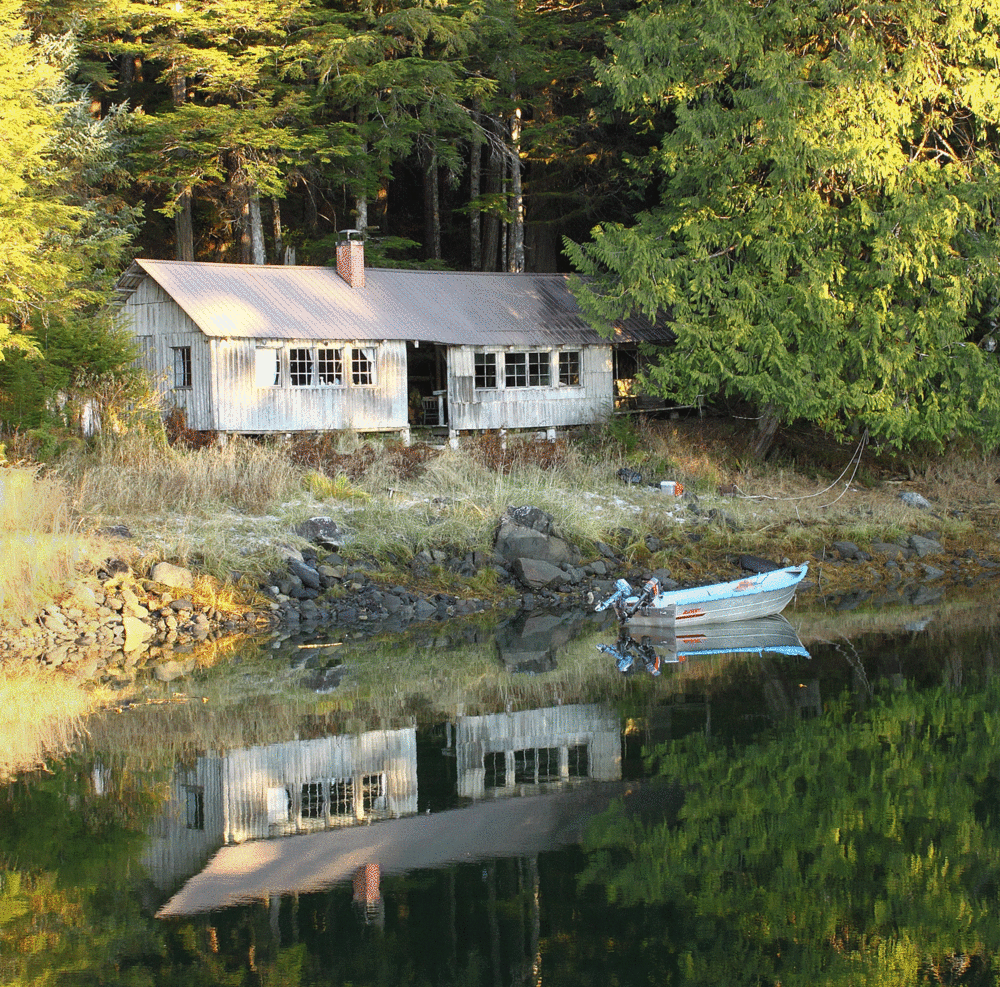 This is how the cabin looks today. The original cabin is on the left. In the late 1950's Mack and Mattie added the woodshed to the right of the center opening.