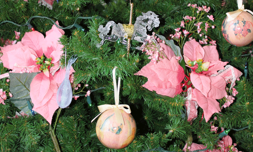 Beautiful decorations adorn a tree in Christmas Tree Lane.