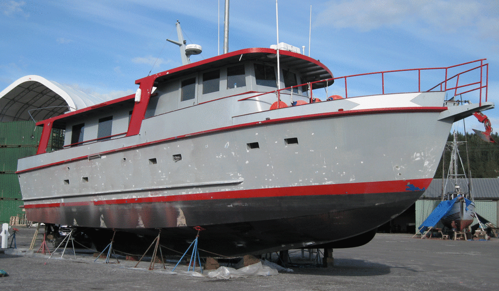 Starboard side hull sanded prior to painting.